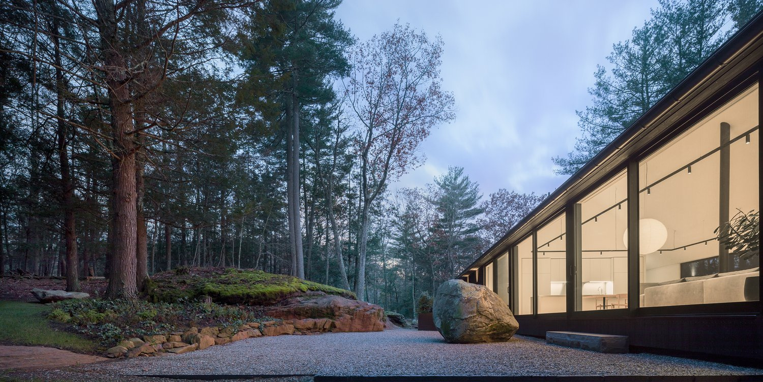 Desai Chia's Ledge House Stands Tall Beside a Prehistoric Boulder in ...
